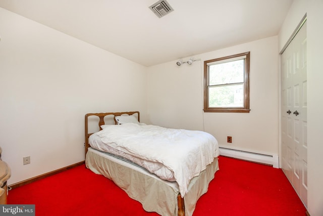 306 Spring Cir, Norristown, PA 19403 - carpeted bedroom featuring baseboard heating, baseboards, and a closet