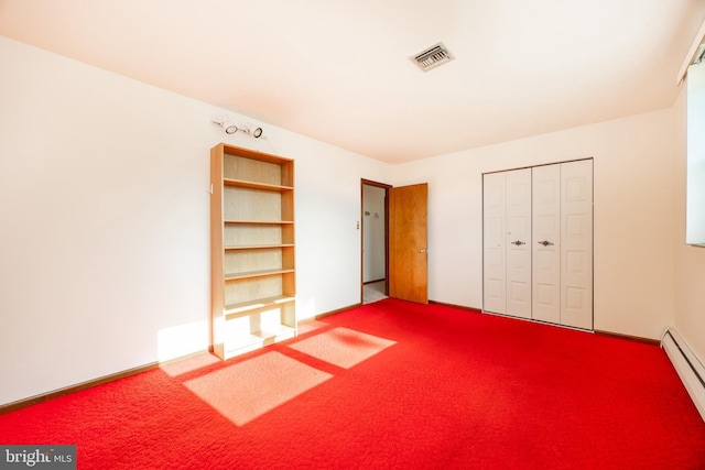 306 Spring Cir, Norristown, PA 19403 - unfurnished bedroom featuring carpet flooring, a baseboard radiator, and a closet