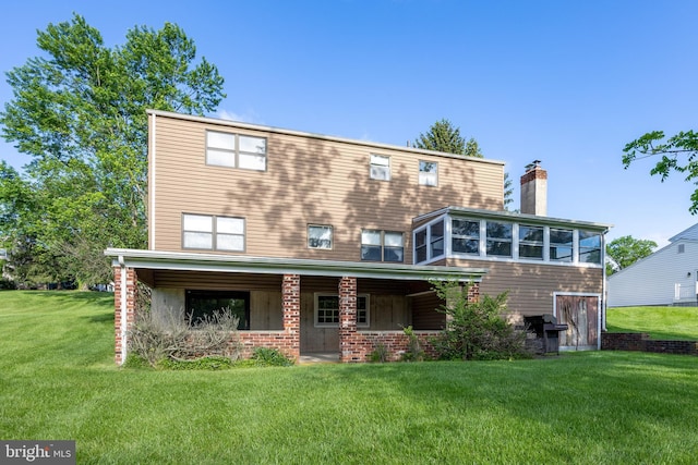306 Spring Cir, Norristown, PA 19403 - rear view of house with a chimney, a lawn, a sunroom, and covered porch