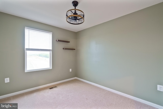 488 National St, Ranson, WV 25438 - spare room featuring carpet and baseboards