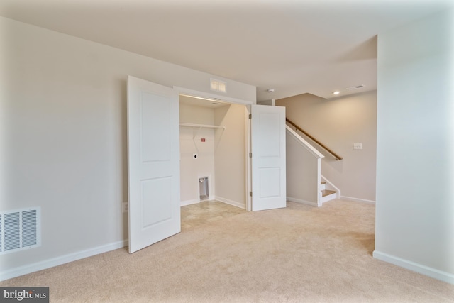 488 National St, Ranson, WV 25438 - carpeted spare room with baseboards, stairs, and recessed lighting