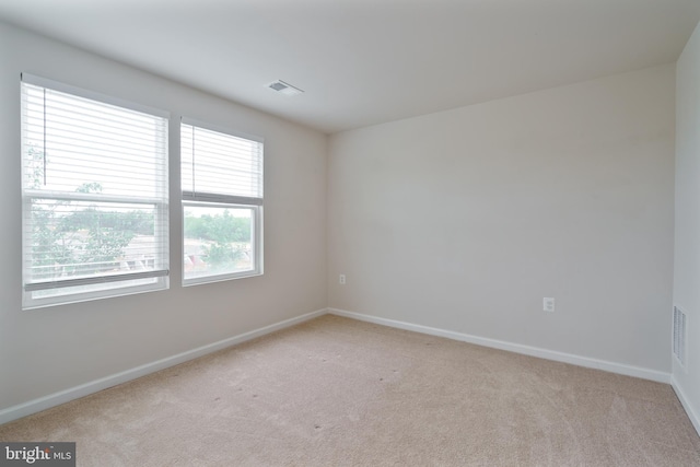488 National St, Ranson, WV 25438 - unfurnished room with light colored carpet and baseboards