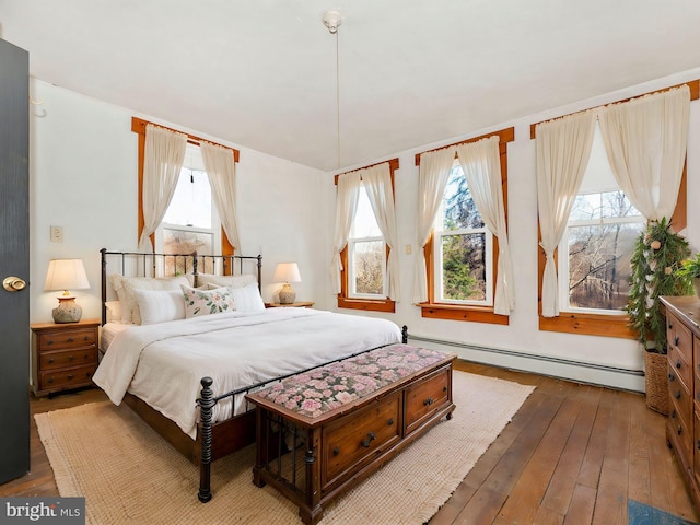 12814 Appel Rd SE, Little Orleans, MD 21766 - bedroom featuring a baseboard radiator and wood-type flooring