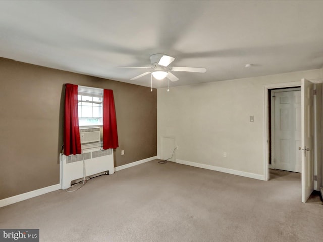 1411 College Ave, Reading, PA 19604 - unfurnished bedroom featuring radiator heating unit, light carpet, baseboards, and cooling unit