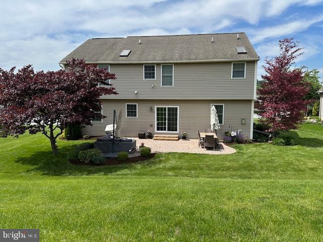 310 Valley Ct, Reading, PA 19608 - back of house with a patio, a lawn, and entry steps