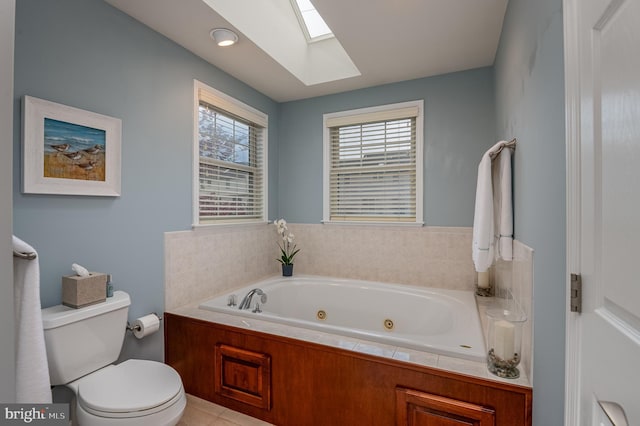 310 Valley Ct, Reading, PA 19608 - full bathroom featuring a skylight, a whirlpool tub, and toilet