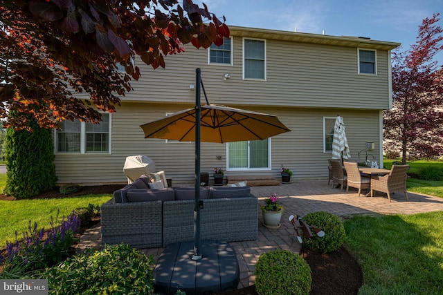 310 Valley Ct, Reading, PA 19608 - rear view of property with an outdoor hangout area, a patio area, and a yard