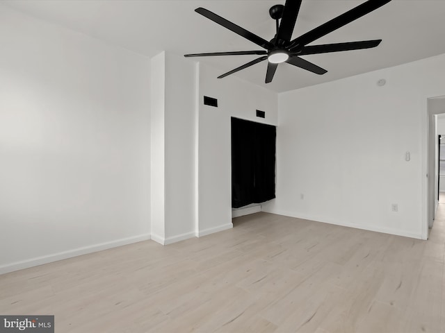 2002 E Preston St, Baltimore, MD 21213 - unfurnished room featuring ceiling fan, light wood-style flooring, and baseboards