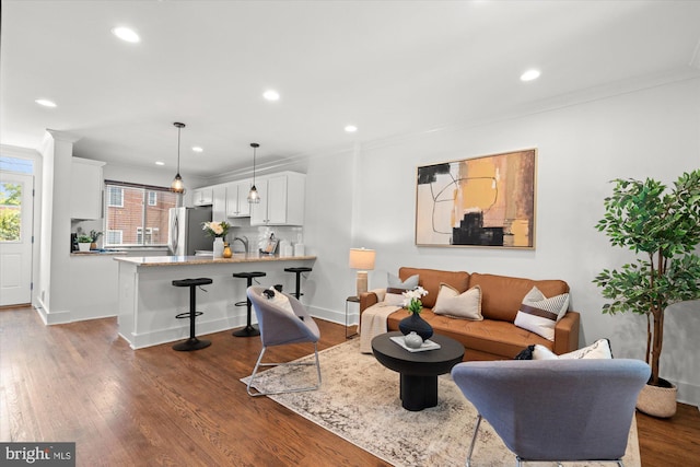 3017 Fulton St, Alexandria, VA 22305 - living room featuring crown molding, recessed lighting, and dark wood-style floors