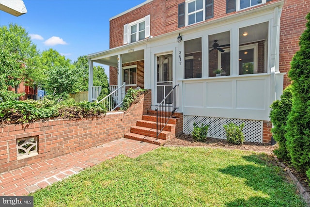 3017 Fulton St, Alexandria, VA 22305 - doorway to property with brick siding and a lawn