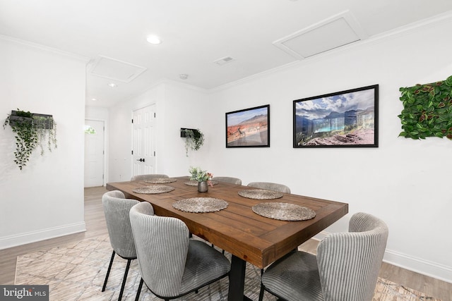 2920 Weisman Rd, Silver Spring, MD 20902 - dining room with light wood-style floors, recessed lighting, baseboards, ornamental molding, and attic access