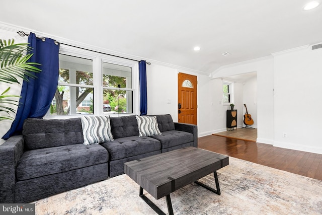2920 Weisman Rd, Silver Spring, MD 20902 - living area with ornamental molding, recessed lighting, wood finished floors, and baseboards