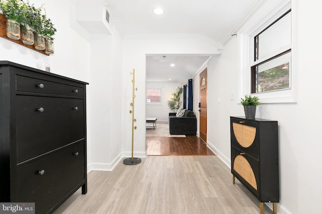 2920 Weisman Rd, Silver Spring, MD 20902 - hallway with light wood-type flooring, ornamental molding, baseboards, and recessed lighting