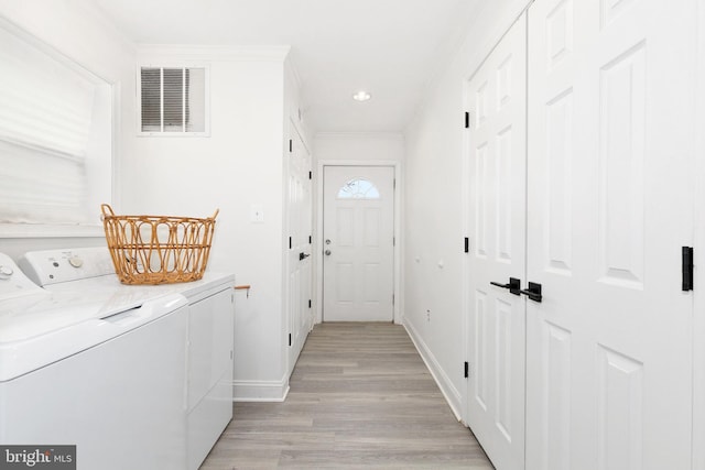 2920 Weisman Rd, Silver Spring, MD 20902 - laundry area featuring separate washer and dryer, light wood-style floors, baseboards, ornamental molding, and recessed lighting