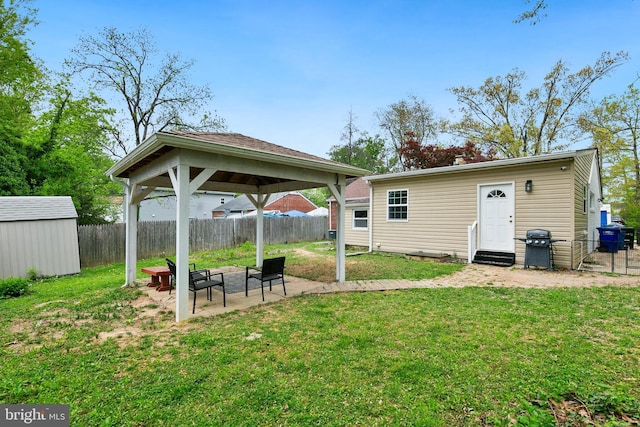2920 Weisman Rd, Silver Spring, MD 20902 - view of yard with a gazebo, an outbuilding, entry steps, and a patio