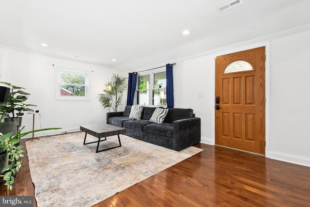 2920 Weisman Rd, Silver Spring, MD 20902 - living area with dark wood-style flooring, ornamental molding, baseboards, and recessed lighting