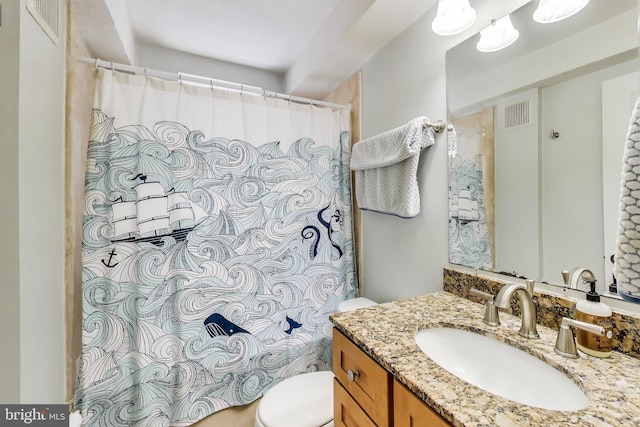 1502 13th St NW Unit 1, Washington, DC 20005 - bathroom featuring toilet, vanity, and curtained shower