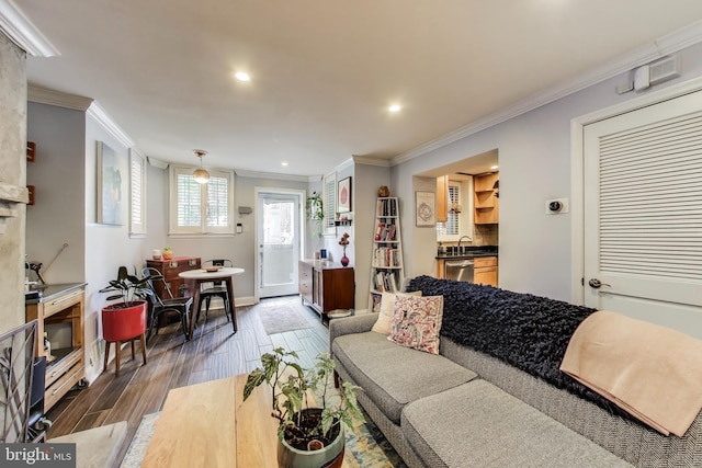1502 13th St NW Unit 1, Washington, DC 20005 - living room with crown molding, recessed lighting, wood finished floors, and baseboards