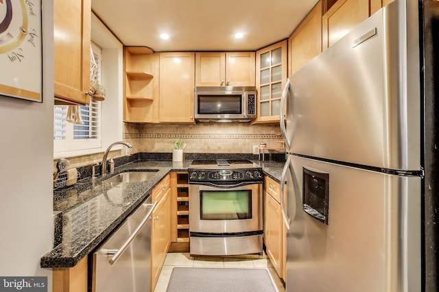 1502 13th St NW Unit 1, Washington, DC 20005 - kitchen with stainless steel appliances, a sink, light brown cabinetry, open shelves, and backsplash