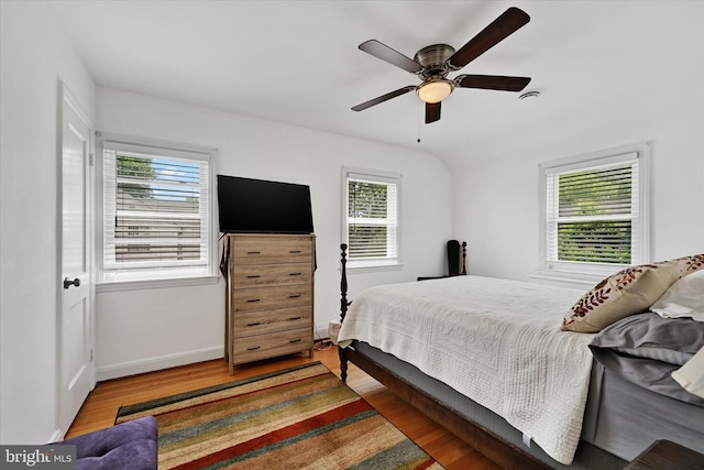 619 Warwick Rd, Baltimore, MD 21229 - bedroom with wood finished floors, baseboards, and ceiling fan