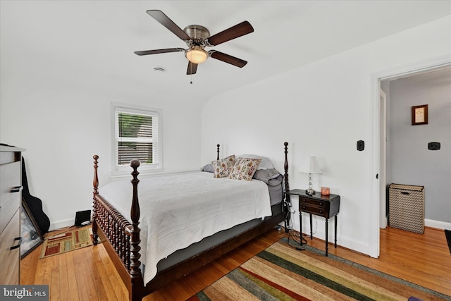 619 Warwick Rd, Baltimore, MD 21229 - bedroom with baseboards, wood finished floors, and ceiling fan