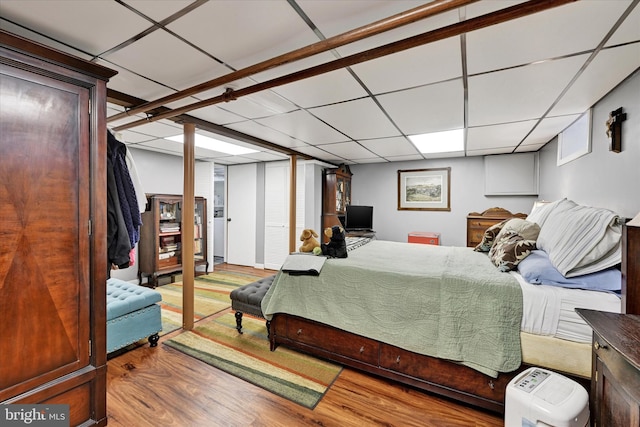 619 Warwick Rd, Baltimore, MD 21229 - bedroom with wood finished floors and a drop ceiling