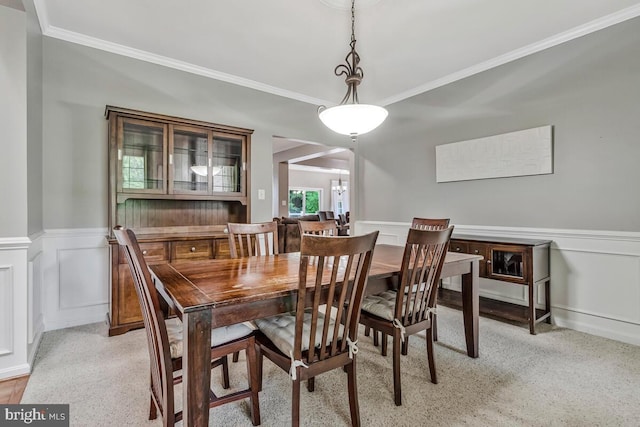 141 Lorins Dr, Huntingtown, MD 20639 - dining area featuring ornamental molding, a wainscoted wall, and a decorative wall