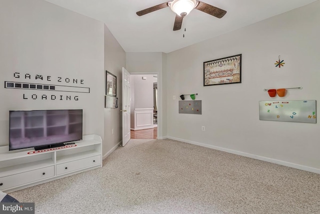141 Lorins Dr, Huntingtown, MD 20639 - unfurnished living room featuring a ceiling fan, carpet flooring, and baseboards