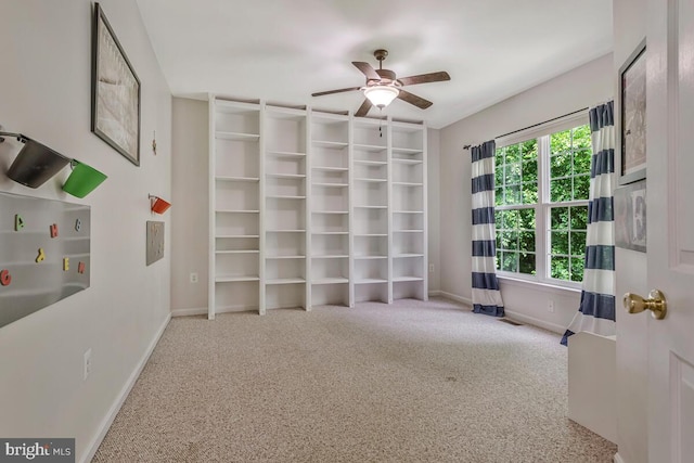 141 Lorins Dr, Huntingtown, MD 20639 - unfurnished bedroom with carpet flooring, baseboards, and a ceiling fan