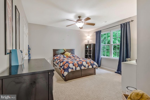 141 Lorins Dr, Huntingtown, MD 20639 - carpeted bedroom featuring baseboards and a ceiling fan