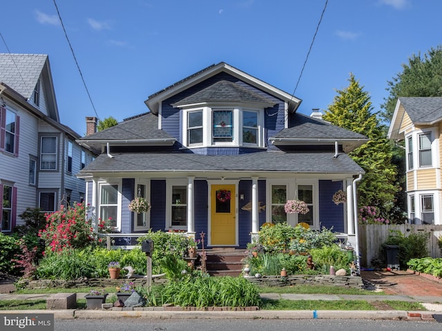 8 S Main St, Stockton, NJ 08559 - view of front facade with a porch and a shingled roof