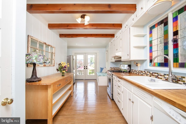 8 S Main St, Stockton, NJ 08559 - kitchen featuring stainless steel appliances, a sink, wood counters, open shelves, and french doors