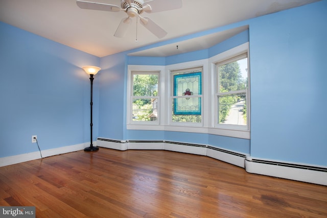 8 S Main St, Stockton, NJ 08559 - spare room with healthy amount of natural light, wood finished floors, baseboards, and ceiling fan