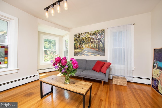8 S Main St, Stockton, NJ 08559 - living area with a baseboard radiator and wood finished floors