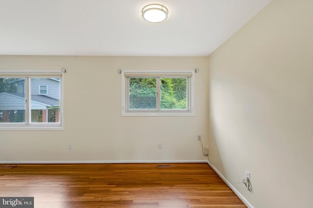 8230 Citadel Pl, Vienna, VA 22180 - unfurnished room featuring wood finished floors and baseboards