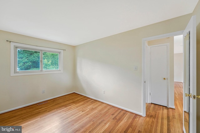 8230 Citadel Pl, Vienna, VA 22180 - empty room with light wood-style flooring and baseboards