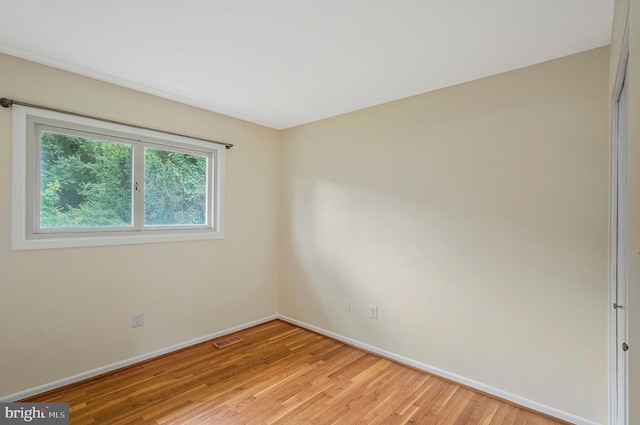 8230 Citadel Pl, Vienna, VA 22180 - spare room featuring baseboards and light wood finished floors