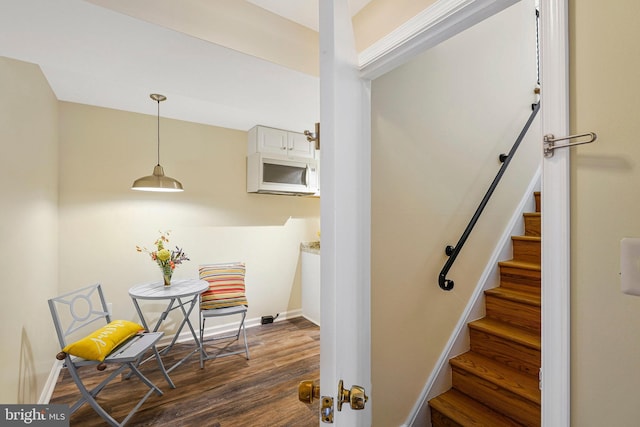8230 Citadel Pl, Vienna, VA 22180 - staircase with wood finished floors and baseboards