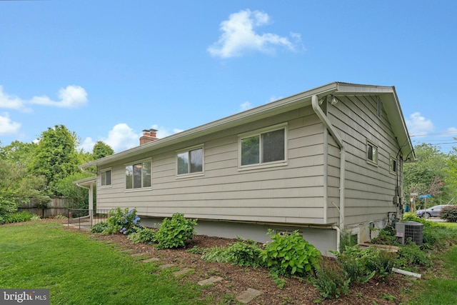 8230 Citadel Pl, Vienna, VA 22180 - view of side of property featuring a chimney and central air condition unit