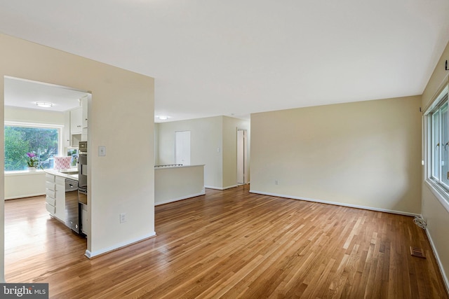 8230 Citadel Pl, Vienna, VA 22180 - empty room featuring light wood-style floors and baseboards