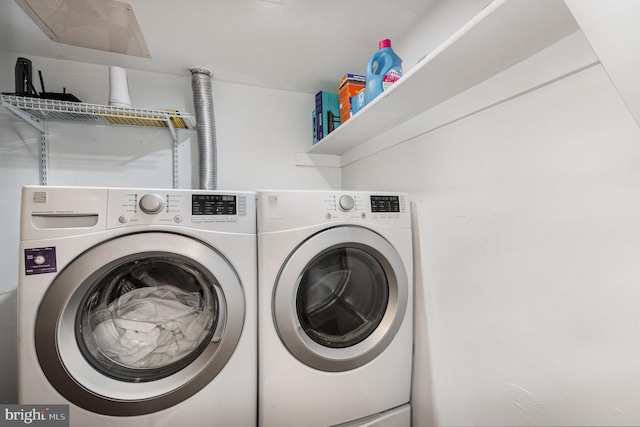 1040 Deer Ridge Dr Unit 101, Baltimore, MD 21210 - washroom with washing machine and dryer