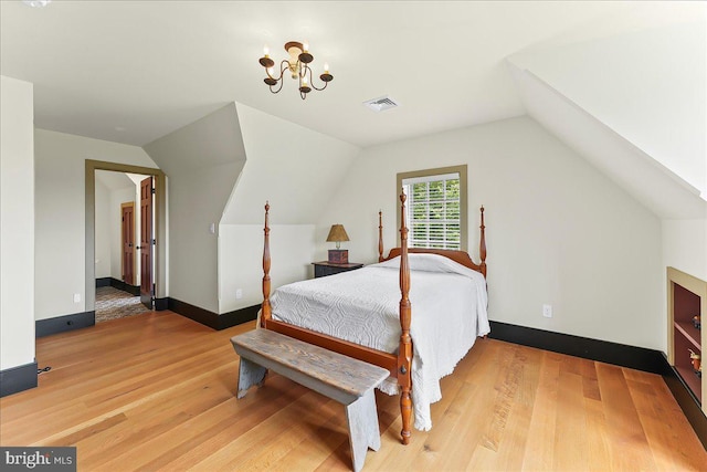 103 Orchard Hill Ln, Elverson, PA 19520 - bedroom featuring wood finished floors, vaulted ceiling, and baseboards