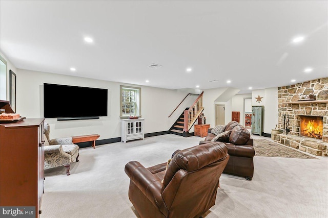 103 Orchard Hill Ln, Elverson, PA 19520 - living room with light carpet, stairway, recessed lighting, and a fireplace