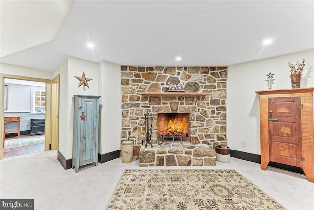 103 Orchard Hill Ln, Elverson, PA 19520 - living area featuring a stone fireplace, carpet, baseboards, and recessed lighting