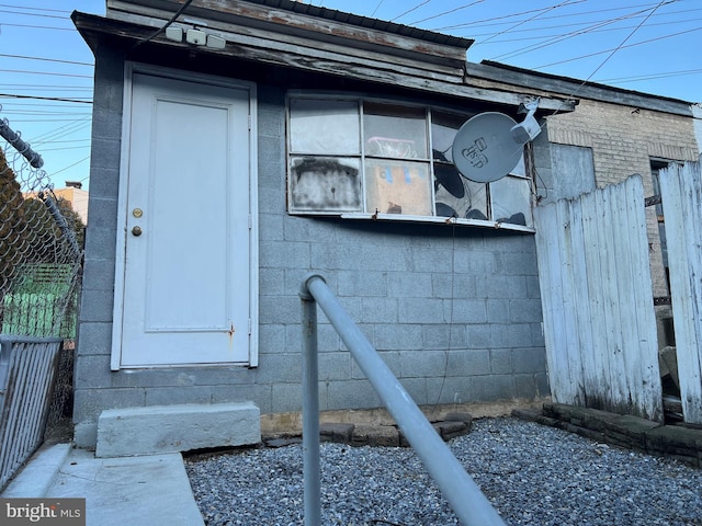 735 Locust St, Reading, PA 19604 - property entrance featuring concrete block siding