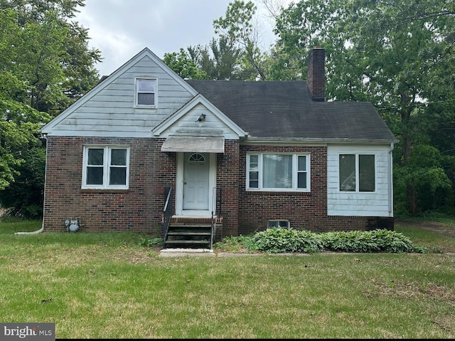251 Wheat Rd, Vineland, NJ 08360 - bungalow with a front lawn, a chimney, and brick siding