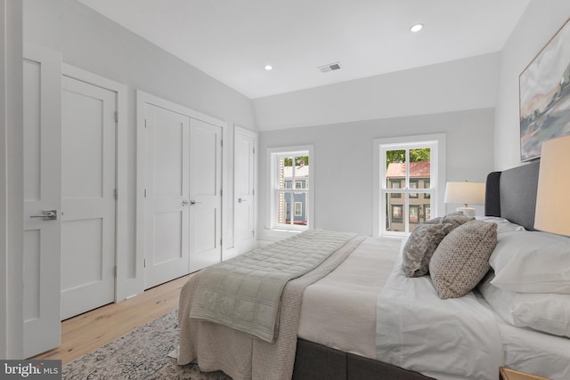 330 N Patrick St, Alexandria, VA 22314 - bedroom featuring light wood-type flooring, recessed lighting, lofted ceiling, and a closet