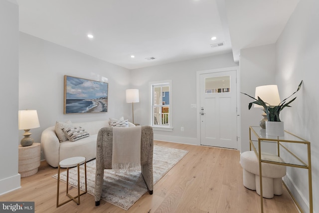 330 N Patrick St, Alexandria, VA 22314 - living area featuring light wood-style floors, baseboards, and recessed lighting
