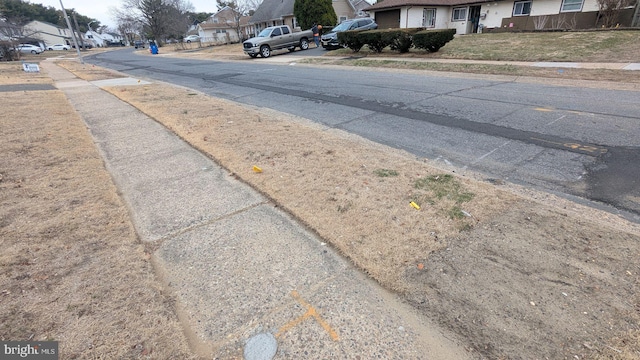 71 Shawmont Ln, Willingboro, NJ 08046 - view of asphalt road featuring sidewalks and a residential view