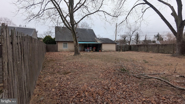71 Shawmont Ln, Willingboro, NJ 08046 - fenced backyard featuring a carport